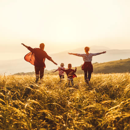 Family of four outdoors