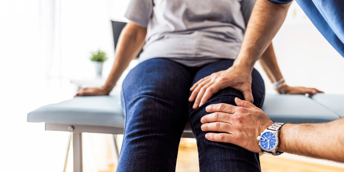 hands on patient's knee