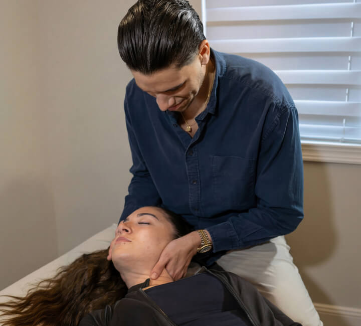 Dr. Besson adjusting patient