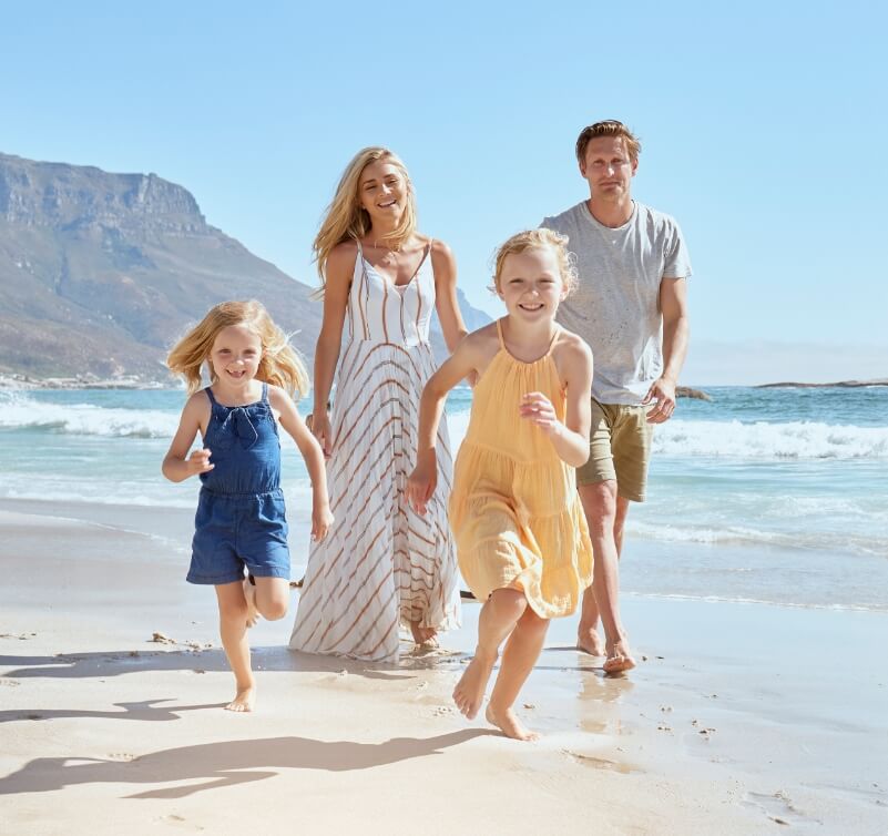 family of 4 at the beach