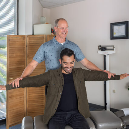 Man with arms extended