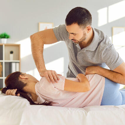 Shoulder chiropractic adjustment woman