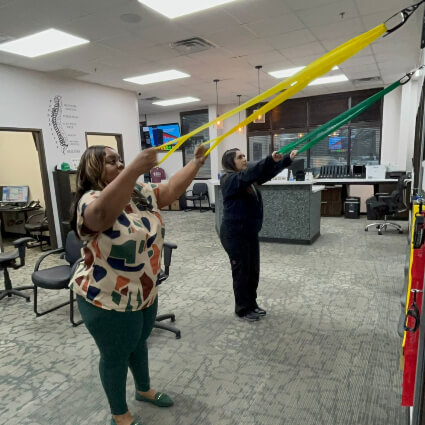 Patients using stretching equipment