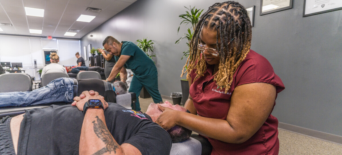 Houston, Dallas and Fort Worth patient receiving am chiropractic neck adjustment