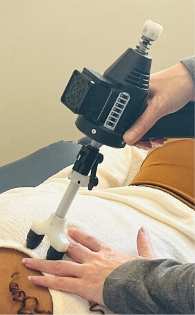 using tool on patients back