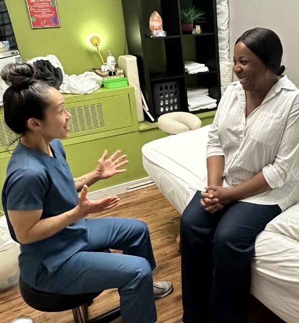 team member talking to patient