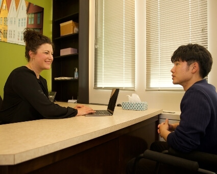 Calgary patient in consultation at Active Back to Health