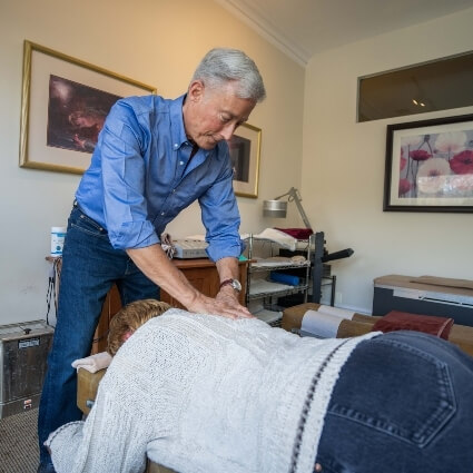 Dr Dale adjusting patient