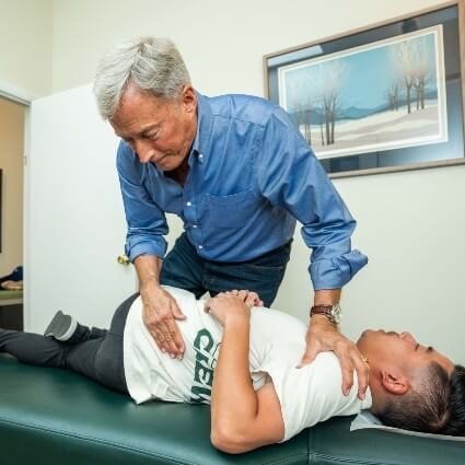 Dr Dale adjusting patient