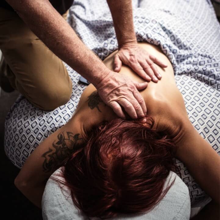 Advantage Chiropractic  patient having back massaged