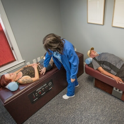 patients laying on decompression tables