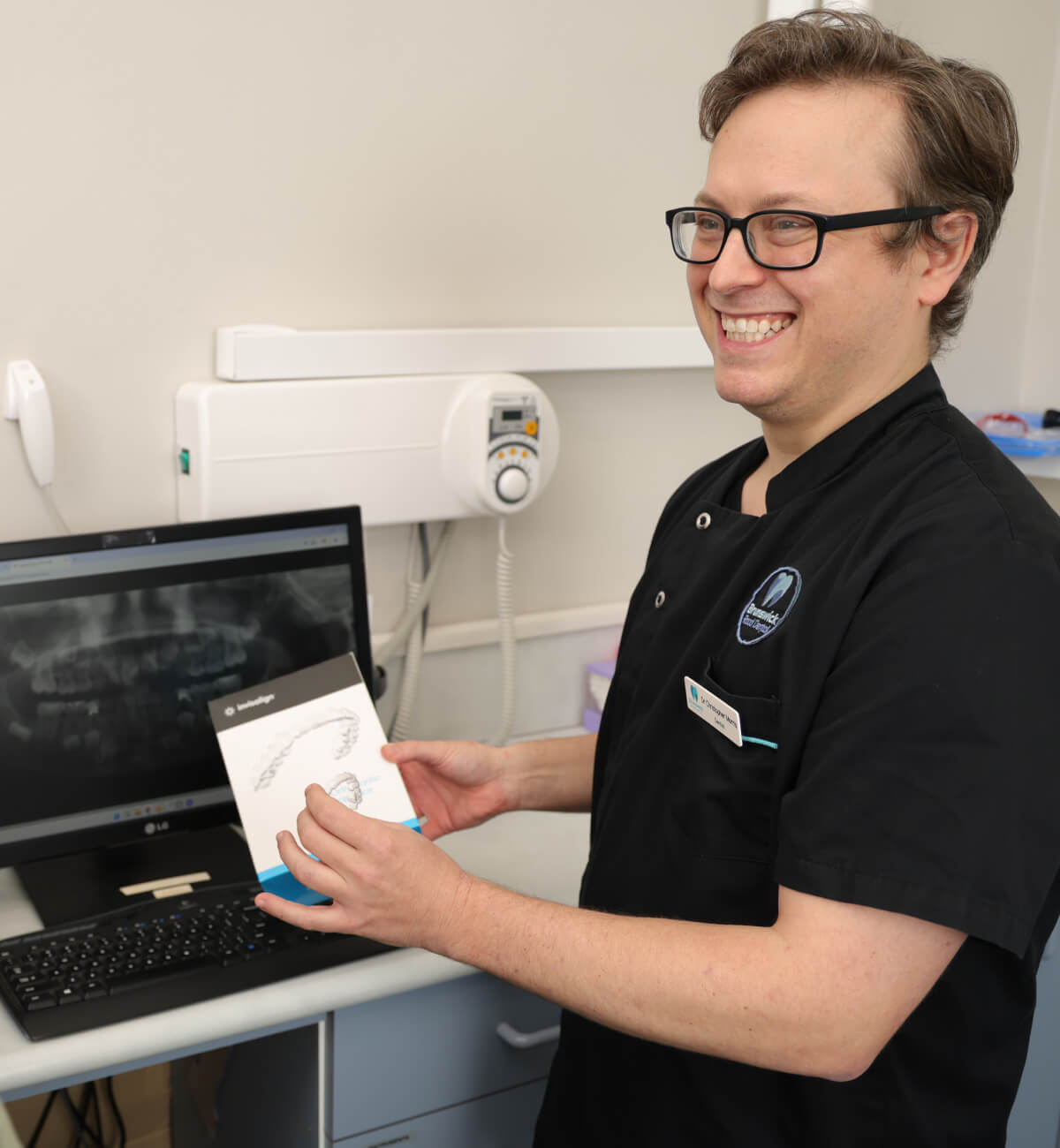 Dr Chris showing Invisalign