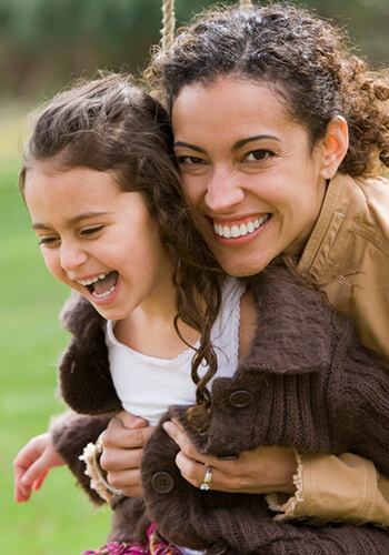mom-and-daughter-on-swing-wide