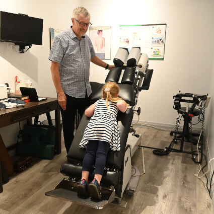 child on adjusting table