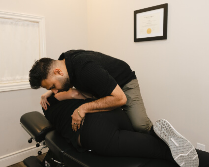 Dr Bali adjusting back