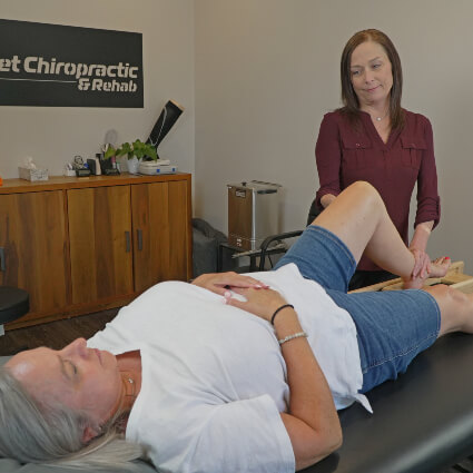 working on patient's leg