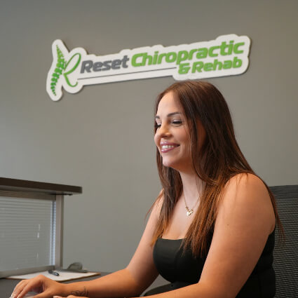 receptionist on computer
