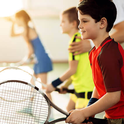 kids playing tennis