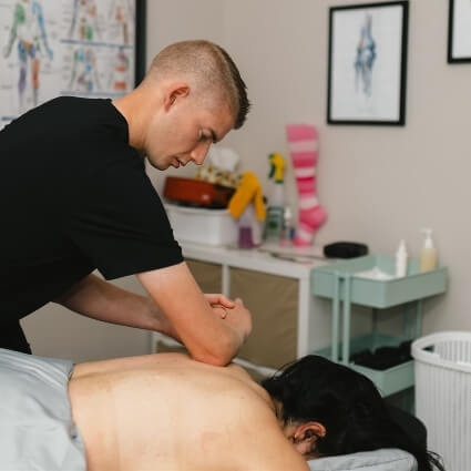 Ian massaging patient