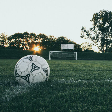 soccer ball on a field of grass