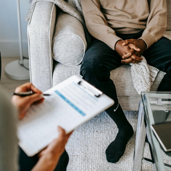 Male patient in a chiropractic consultation
