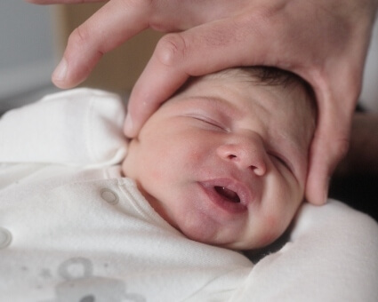 Close up of baby getting neck adjusted