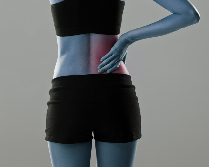 Woman with sciatica pain