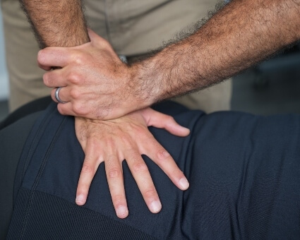 Lower-back adjustment used on male patient