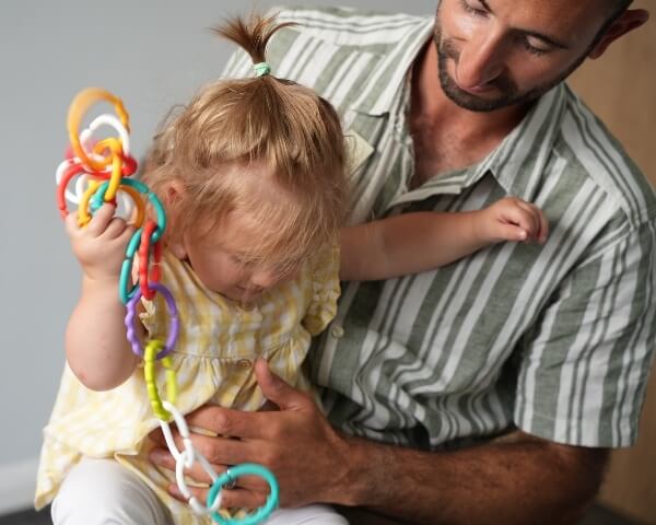 About Us Chiropractor and paediatric patient