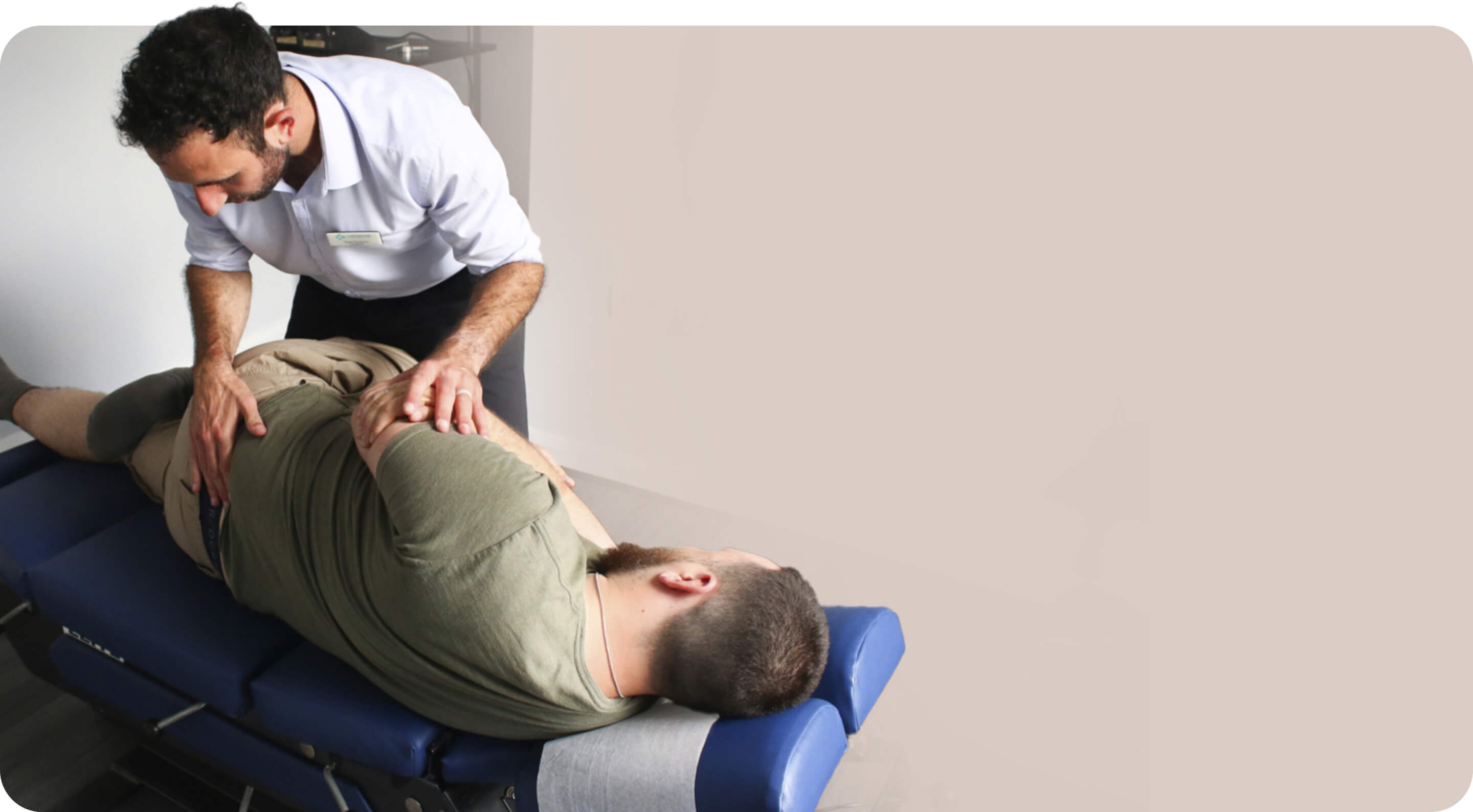 Male Eastbourne patient receiving a chiropractic adjustment