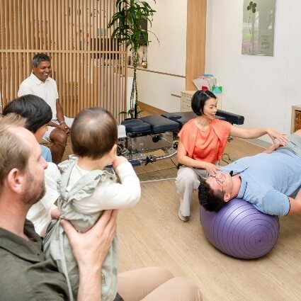 Dr Irene teaching core exercises