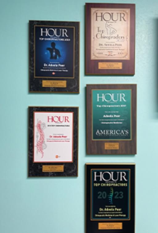 Framed awards hanging on wall