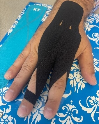 Kinesio tape on hand
