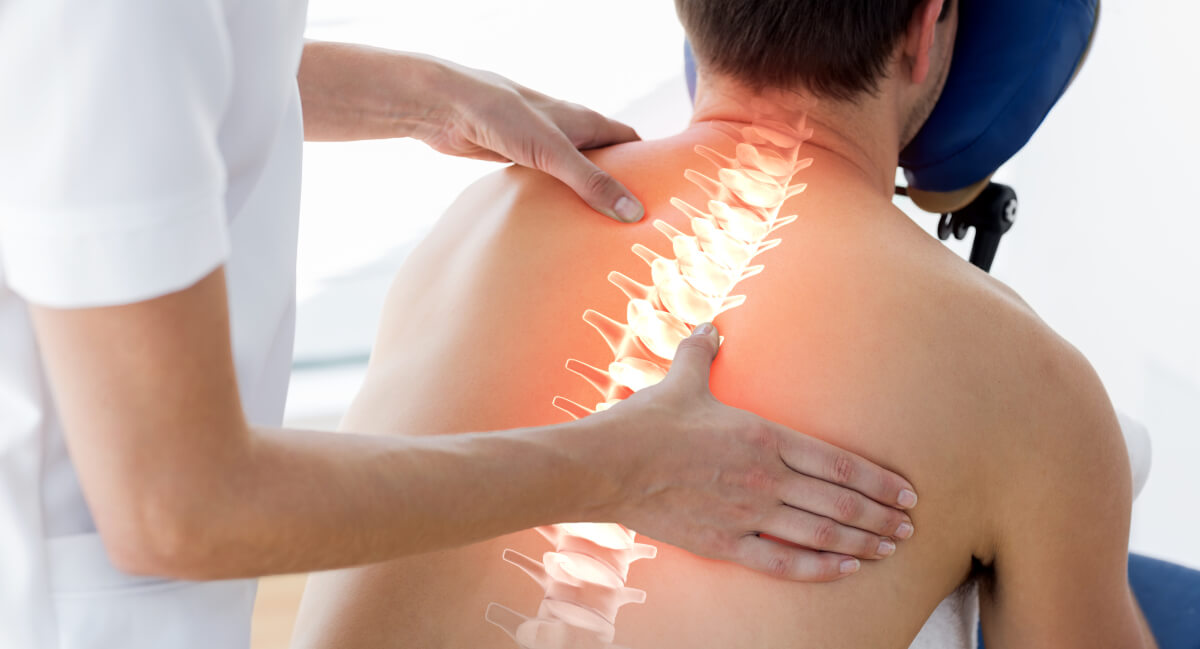 Male patient back adjustment