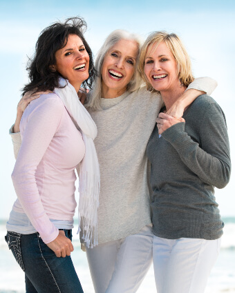 Three smiling women