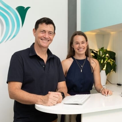 Dr Matt and Audrey at our front desk