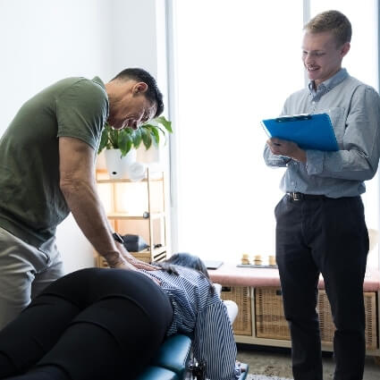 Doctor and assistant during a patient consult