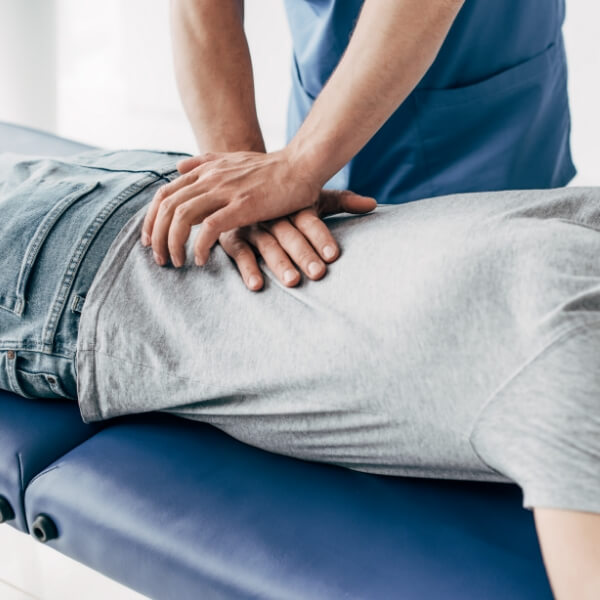 man getting back adjustment