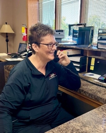 Biermaier Chiropractic Clinic receptionist sitting at desk