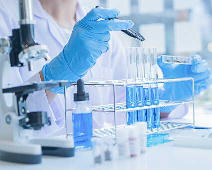 Female lab technician testing samples