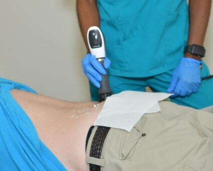 Shockwave Therapy Shockwave therapy used on patient's back