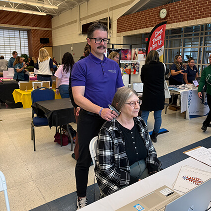 Dr-Brandon-with-patient-at-convention
