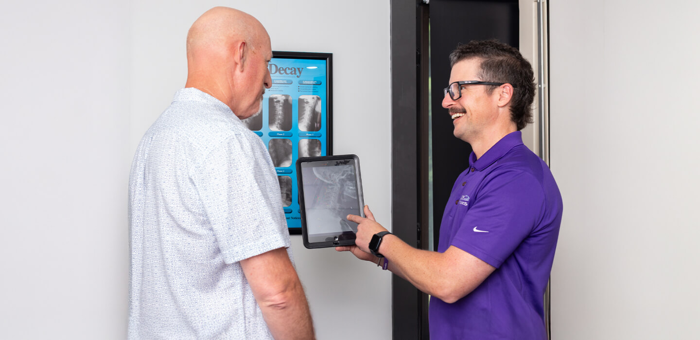 Vienna patient discussing results with chiropractor