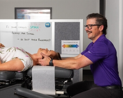 Female patient neck adjustment