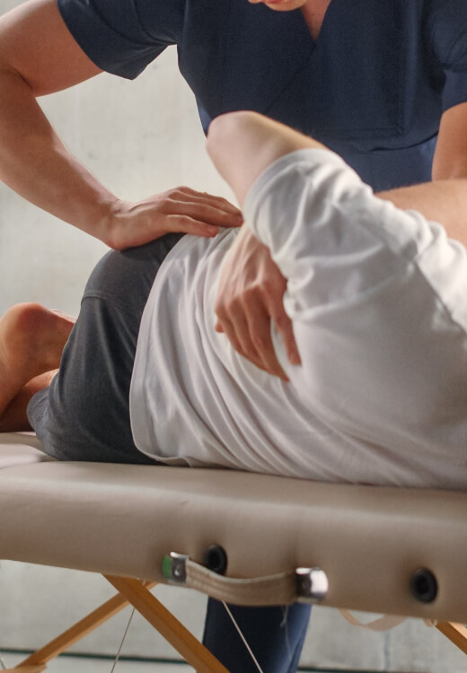 man getting back adjustment