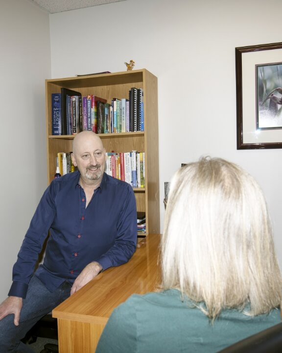 Colorado Health and Wellness Center patient talking with Dr Rick