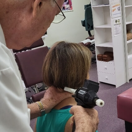 instrument-assisted neck adjustment