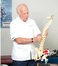 Photo Dr. Harrie Wolverton with spine