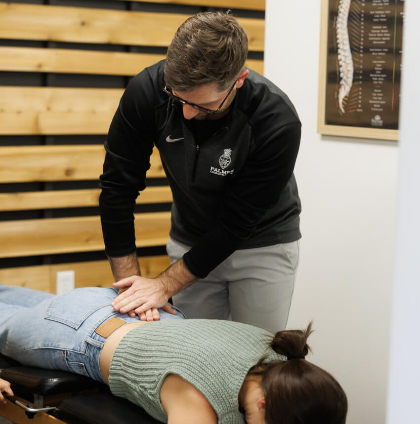 Dr Levi adjusting patients back