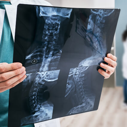 doctor examining xrays